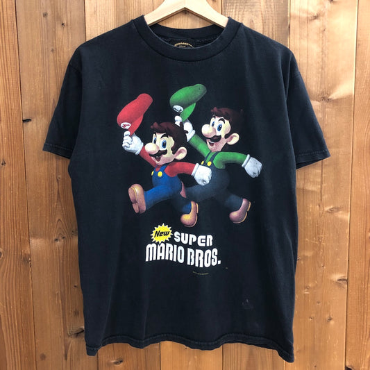 2010年  official Nintendo Seal ニンテンドー オフィシャル NEW SUPER MARIO BRO. ニュースーパーマリオブラザーズ プリントTシャツ 半袖 カットソー キャラクター